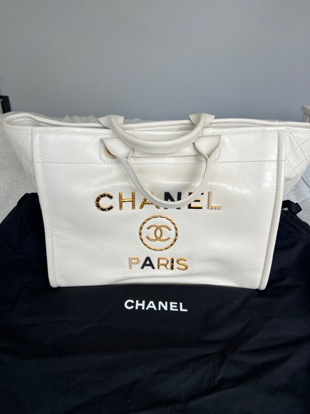 CHANEL White Leather Logo Paris Tote with Gold Accents